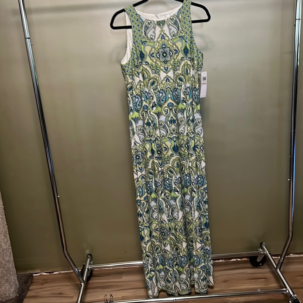 New London Times Maxi dress will 2 slits in front.